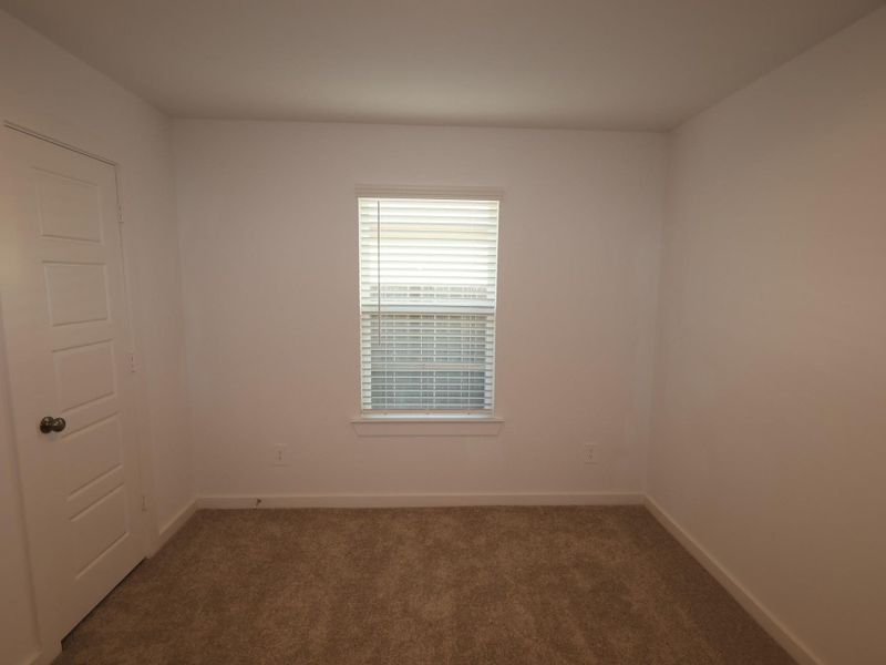 Spacious, unfurnished interior of a new home in Pinewood at Grand Texas, New Caney (Image 23).