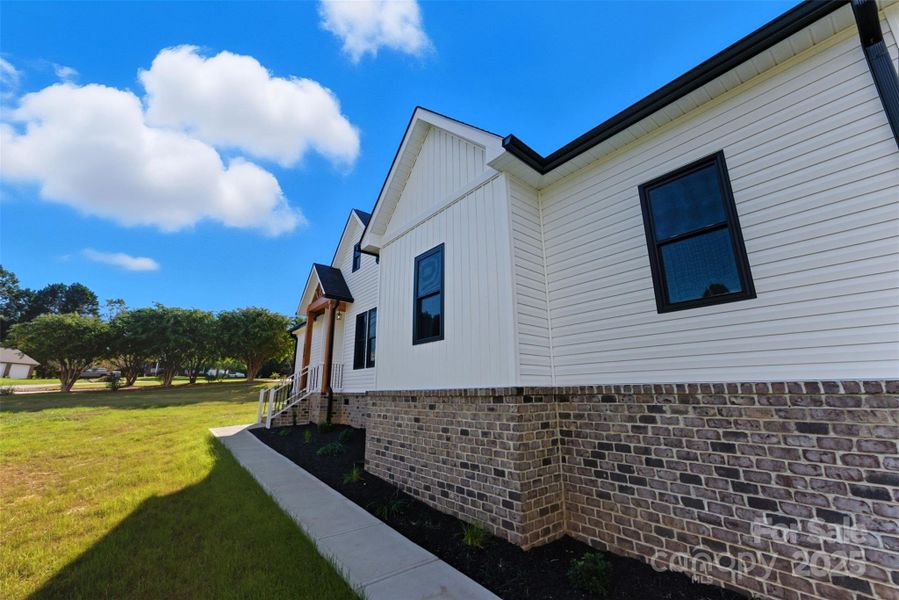 Exterior details and patio area of a home in , Conover (Image 1). Exterior details and patio area of a home in , Conover (Image 1).