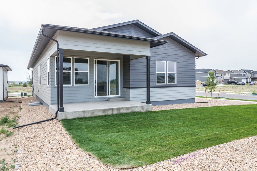 Exterior details and patio area of a home in Prairie Song, Windsor (Image 3).