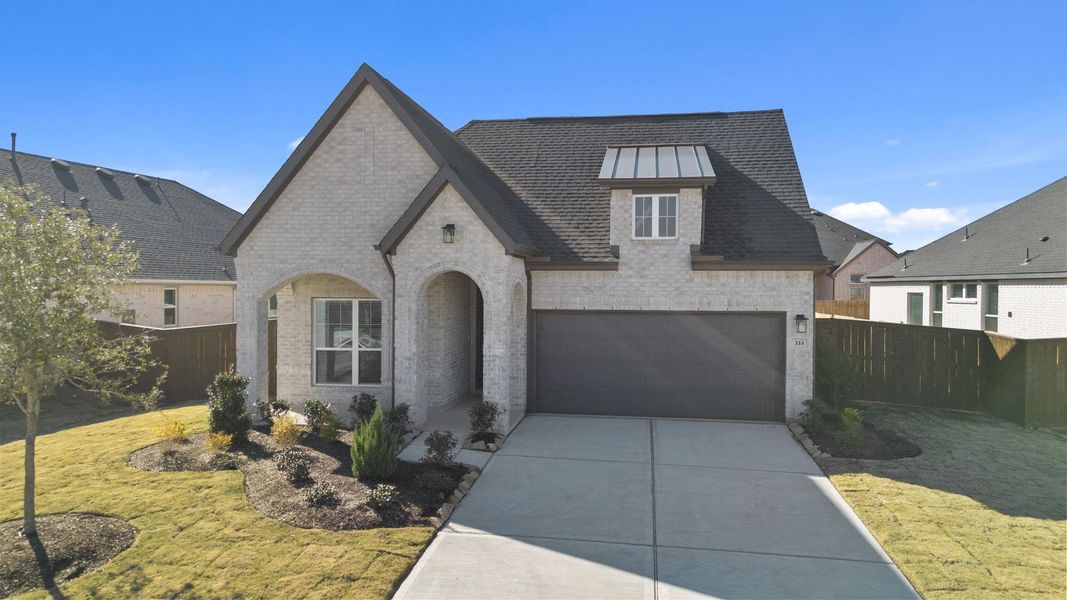 Front exterior of a new home in Attwater, Waller, TX, highlighting curb appeal (Image 18).