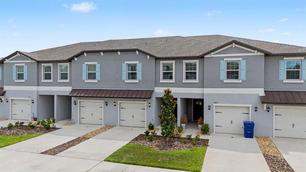 Front exterior of a new home in , San Antonio, FL, highlighting curb appeal (Image 27).