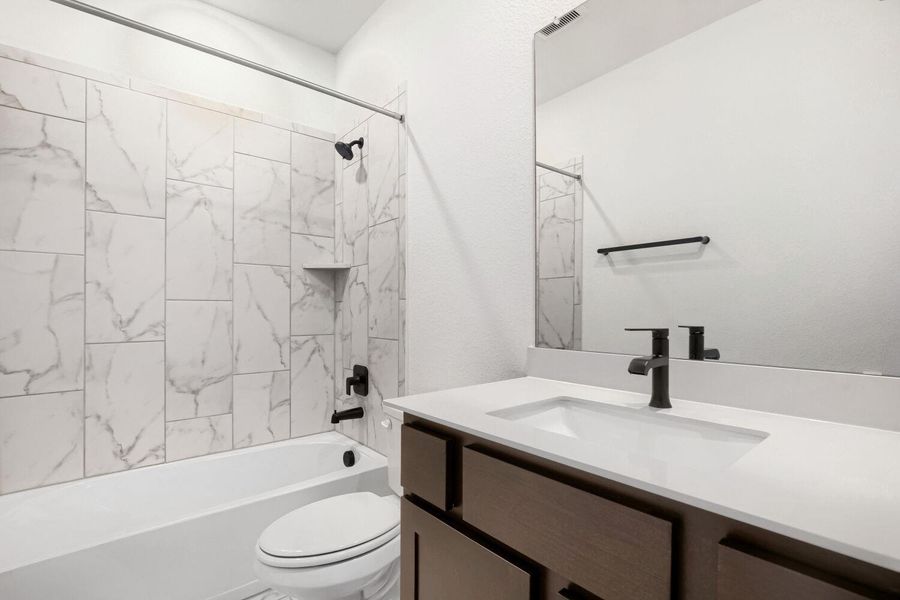 Furnished interior view inside a new home in 6 Creeks at Waterridge, Kyle (Image 20).