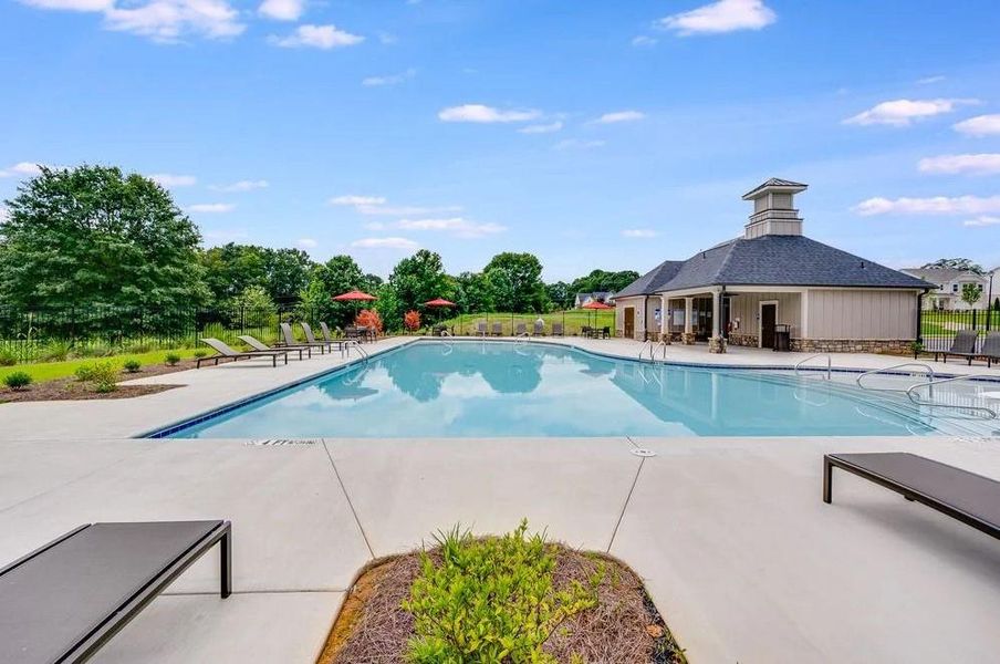 Front exterior of a new home in Windance Lake, Loganville, GA, highlighting curb appeal (Image 20). Front exterior of a new home in Windance Lake, Loganville, GA, highlighting curb appeal (Image 20).