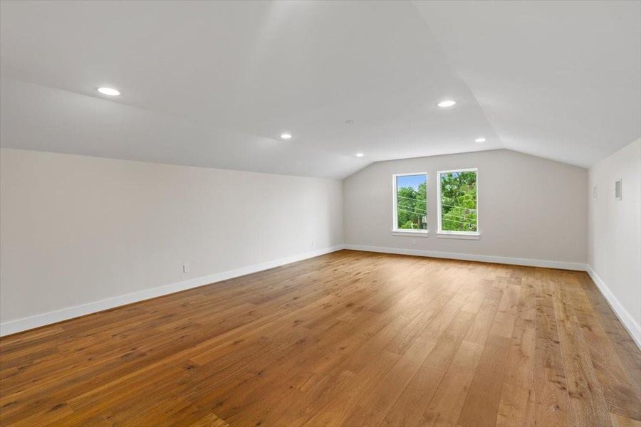 Third floor offers another flex space - man cave, playroom, billiards room, gym/wellness center or even more storage - so many options! This room also has convenient walk in attic access...
