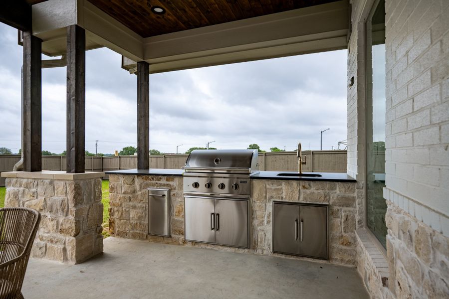 Exterior details and patio area of a home in Stella Ranch, Bryan (Image 35).