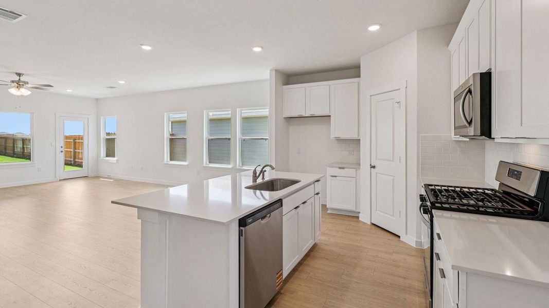 Furnished interior view inside a new home in Monarch Ranch, Manor (Image 5).