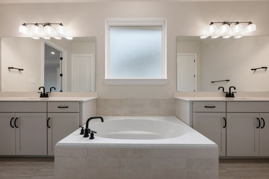 Representative furnished interior of a home built from the Carolina by Ashton Woods in The Estates at La Cima, San Marcos (Image 16). Representative furnished interior of a home built from the Carolina by Ashton Woods in The Estates at La Cima, San Marcos (Image 16).