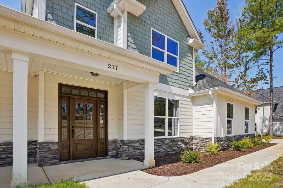 Front exterior of a new home in , Rock Hill, SC, highlighting curb appeal (Image 1).