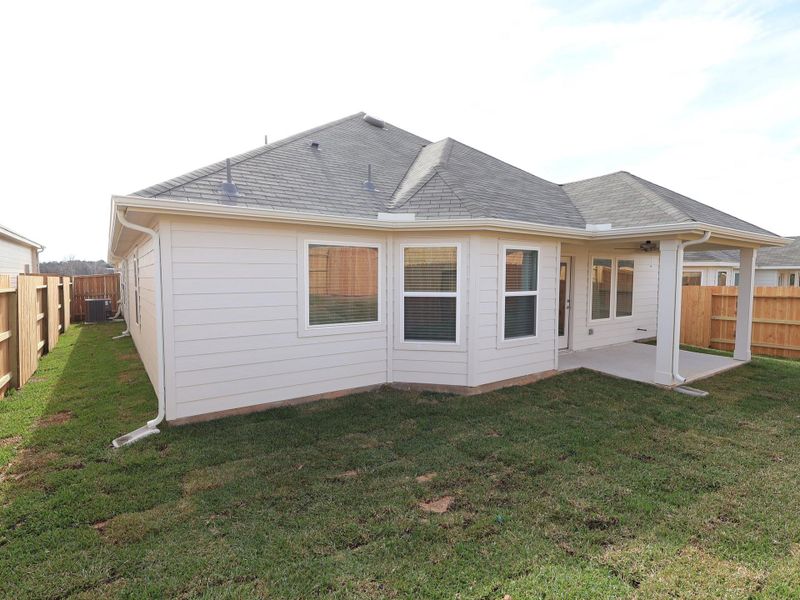 Exterior details and patio area of a home in Lone Star Landing, Montgomery (Image 26).