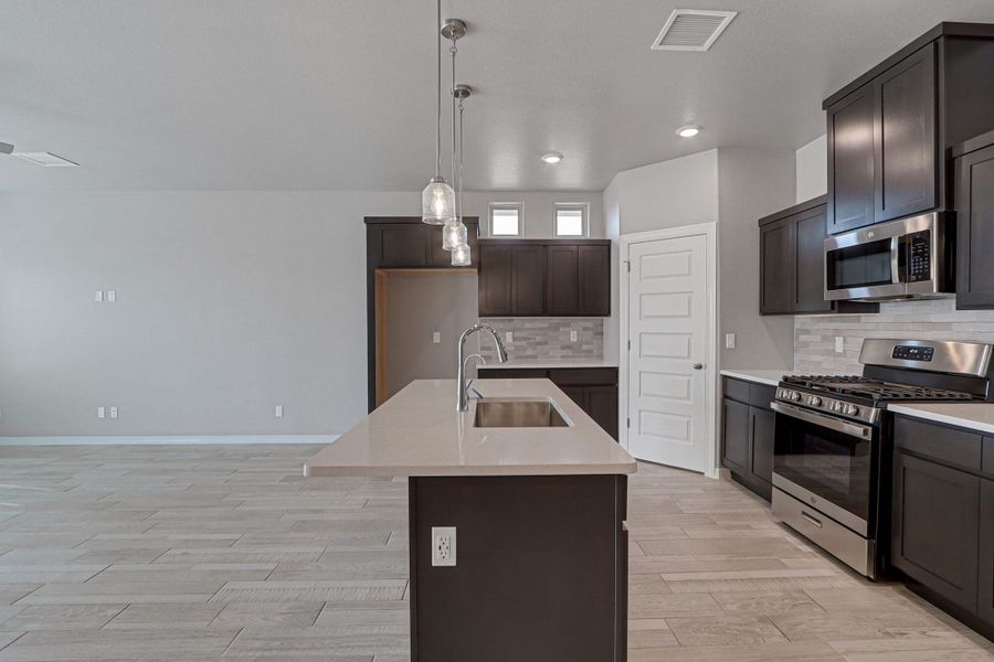 Furnished interior view inside a new home in Emerald Estates, Horizon City (Image 10).