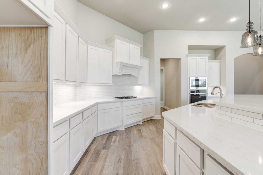 Representative furnished interior of a home built from the 2688 by Ravenna Homes in The Woodlands Hills 65′, Willis (Image 6).