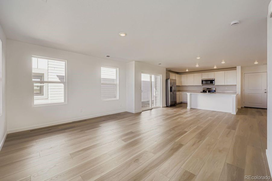 Spacious, unfurnished interior of a new home in Percheron: The Explorer Collection, Colorado Springs (Image 9).