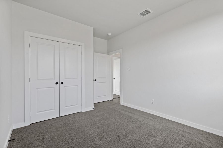 Representative unfurnished interior of a home built from the Garrison II by Cheldan Homes in Stoneview, Glen Rose (Image 57).