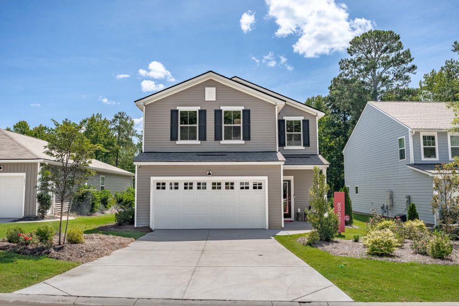 Front exterior of a new home in Grand Arbor, Blythewood, SC, highlighting curb appeal (Image 26).