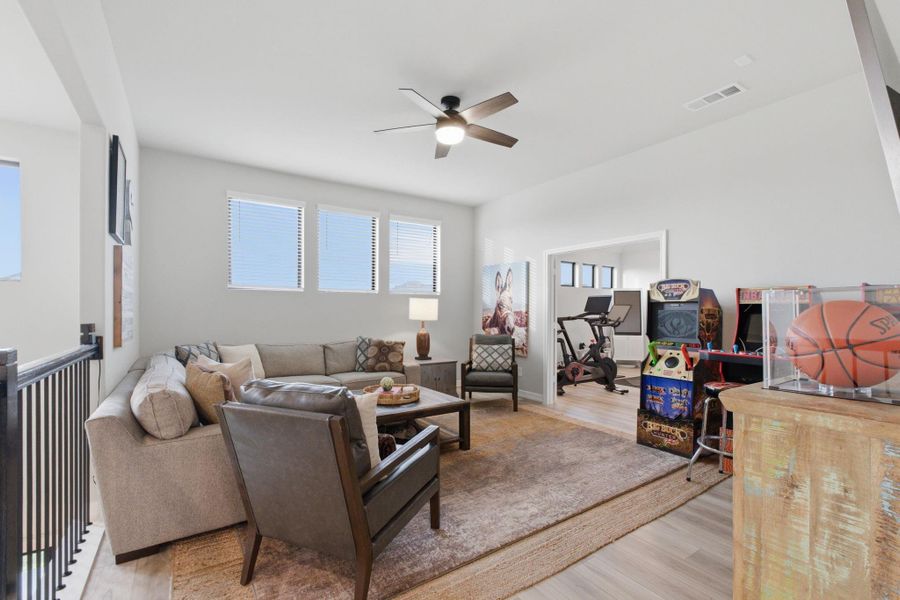 Furnished interior view inside a new home in Sunterra 45ft, Katy (Image 11).