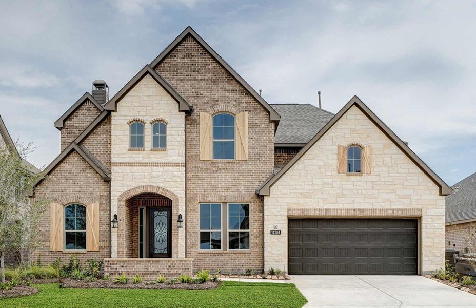 Representative exterior photo of a completed home built from the 3799 by Ravenna Homes in Cross Creek West, Fulshear, TX (Image 27). Representative exterior photo of a completed home built from the 3799 by Ravenna Homes in Cross Creek West, Fulshear, TX (Image 27).