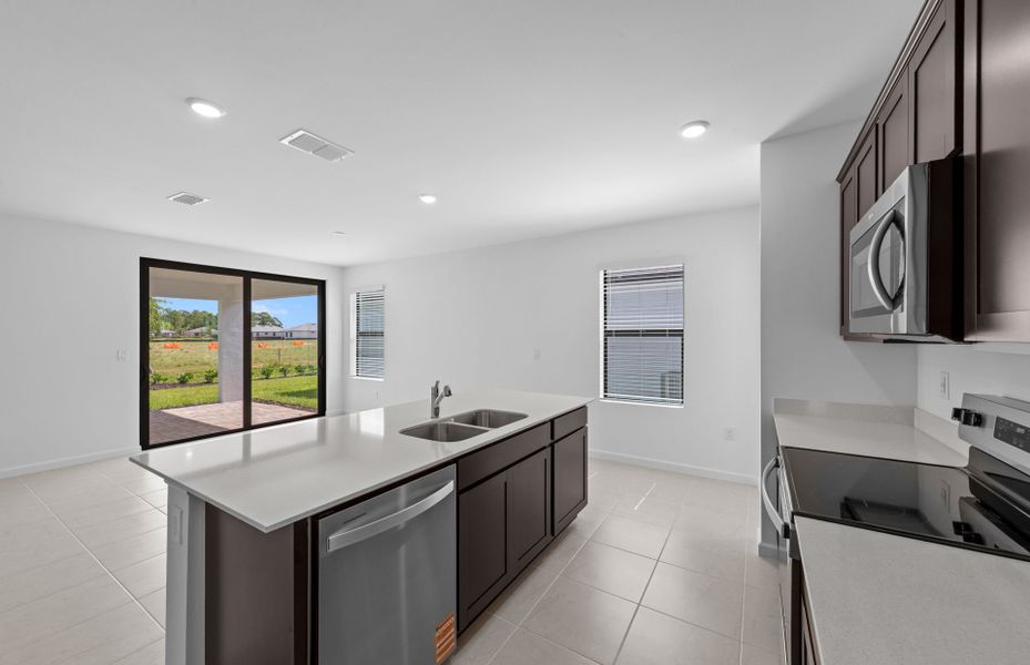 Furnished interior view inside a new home in Caloosa Cove, Labelle (Image 4).