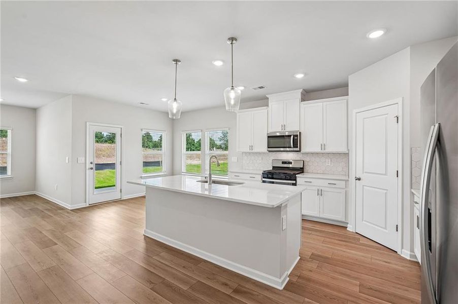Furnished interior view inside a new home in Northwoods at Mirror Lake, Villa Rica (Image 11).