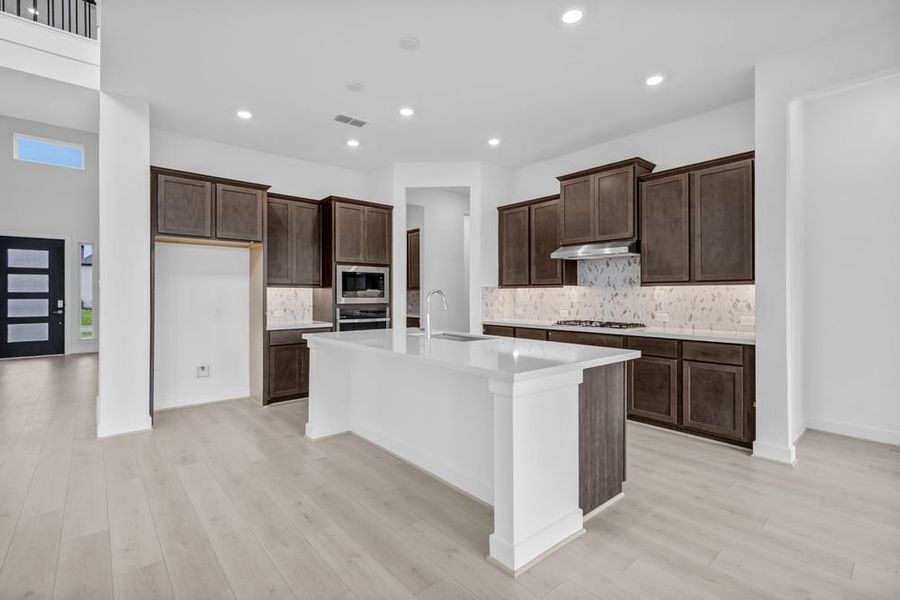 Furnished interior view inside a new home in Avalon at Friendswood 70s, Friendswood (Image 14).