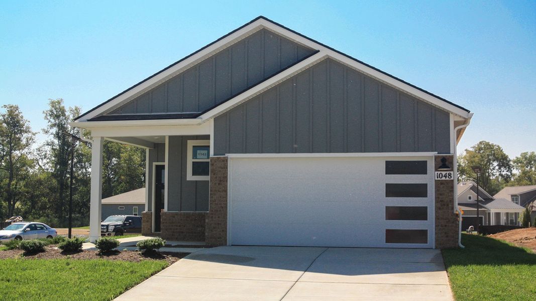 Front exterior of a new home in Nexus South, Gallatin, TN, highlighting curb appeal (Image 22). Front exterior of a new home in Nexus South, Gallatin, TN, highlighting curb appeal (Image 22).