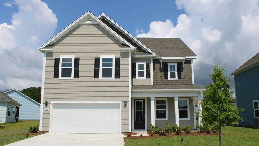 Representative exterior photo of a completed home built from the GLYNN by D.R. Horton in The Forest at Black Bear, Longs, SC (Image 1).