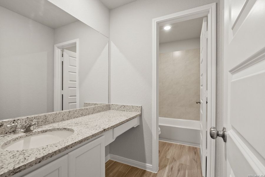 Furnished interior view inside a new home in Abbott Place, St. Hedwig (Image 10).