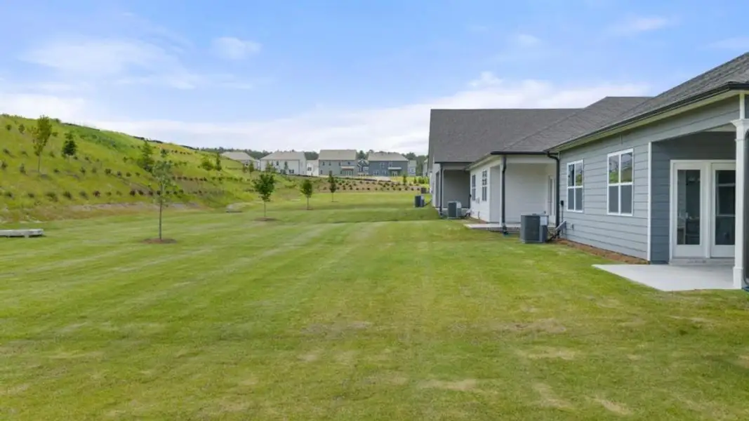 Exterior details and patio area of a home in Hamptons at Riverwood North, Dallas (Image 3).
