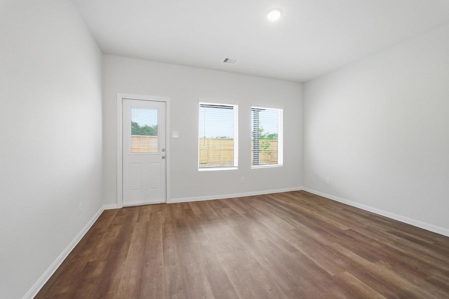 Spacious, unfurnished interior of a new home in The Pines at Seven Coves, Willis (Image 18).