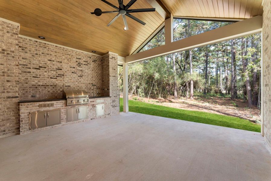 Exterior details and patio area of a home in , New Waverly (Image 30). Exterior details and patio area of a home in , New Waverly (Image 30).