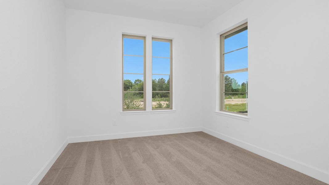 Spacious, unfurnished interior of a new home in Legacy Prairie at Katy Court, Katy (Image 8).