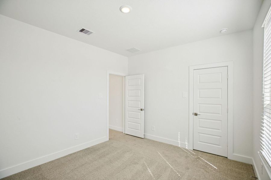 Spacious, unfurnished interior of a new home in Pinewood Trails - Luxe Series, Houston (Image 24).