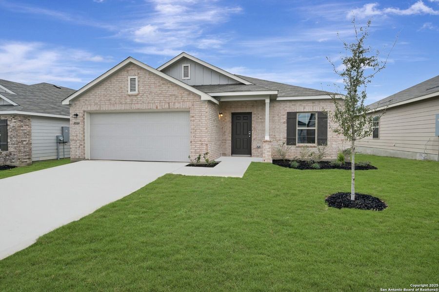 Front exterior of a new home in Paloma Park, Converse, TX, highlighting curb appeal (Image 18).