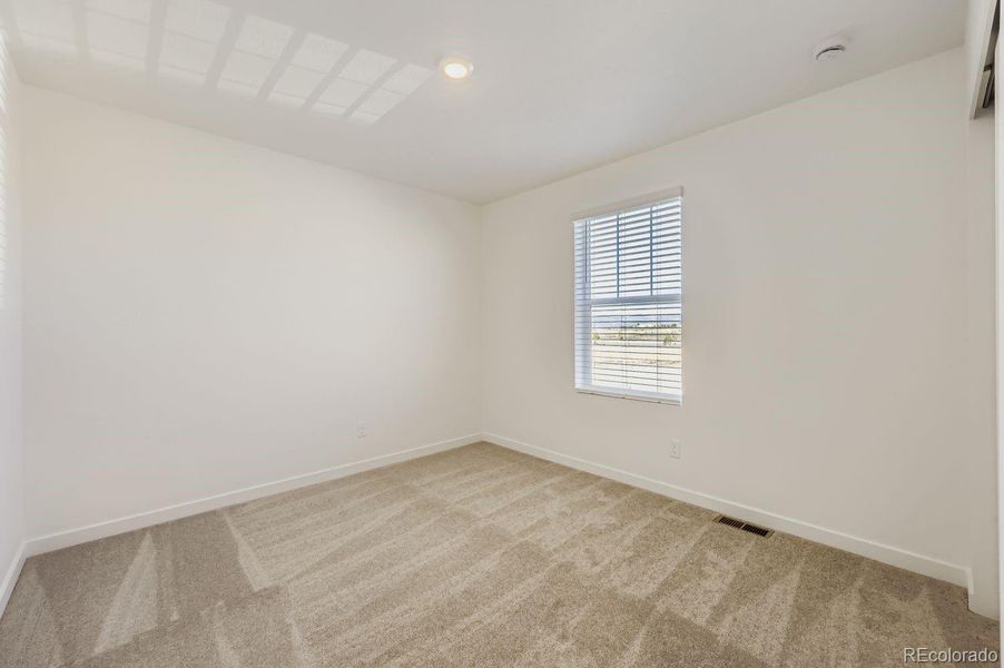 Spacious, unfurnished interior of a new home in Copper Chase: The Celestial Collection, Colorado Springs (Image 11).