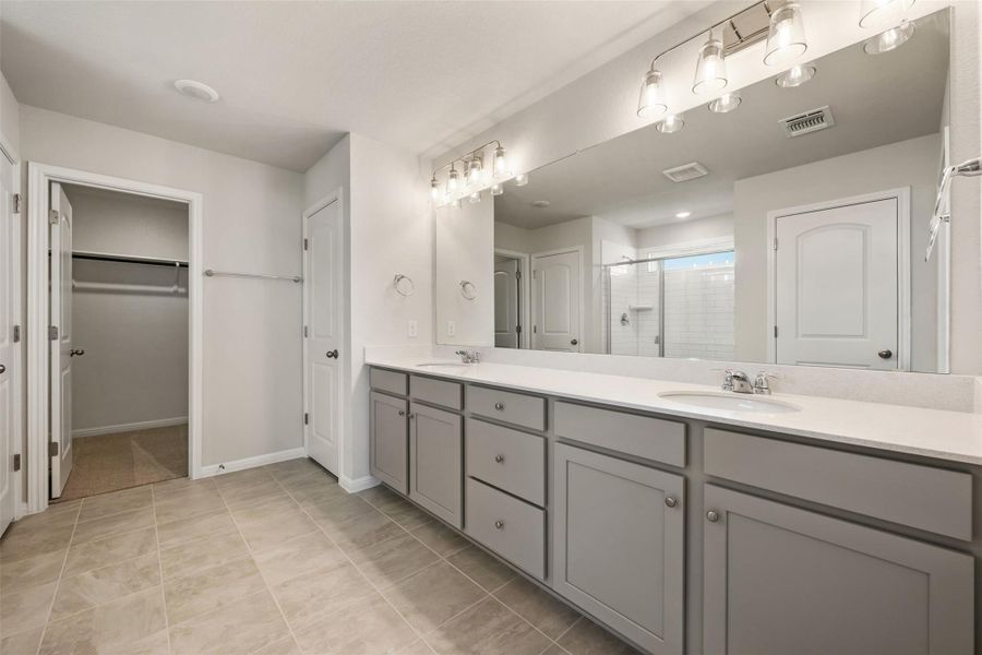 Furnished interior view inside a new home in The Colony 45s, Bastrop (Image 10).