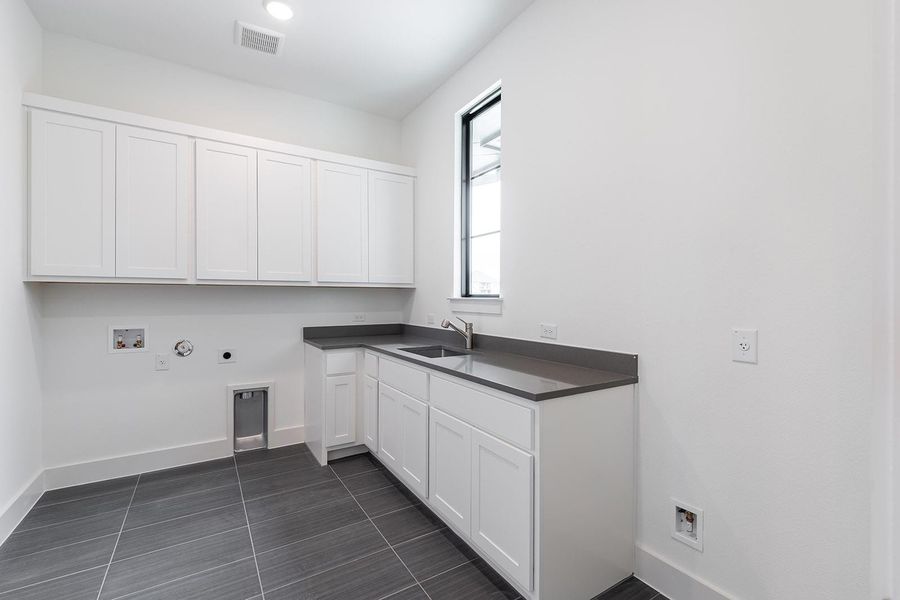 Furnished interior view inside a new home in Hilltop Ranch, Leander (Image 31).