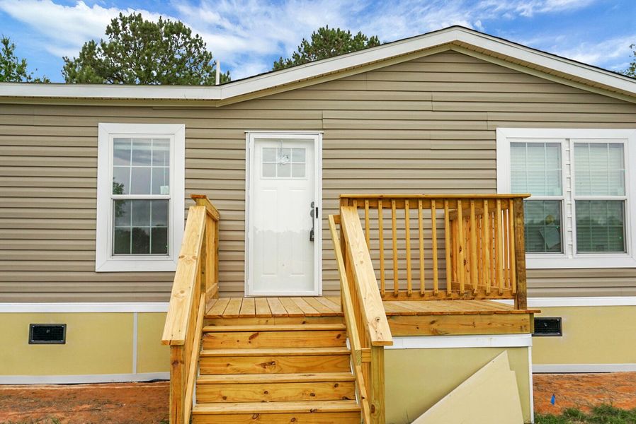 Exterior details and patio area of a home in , Eutawville (Image 27).