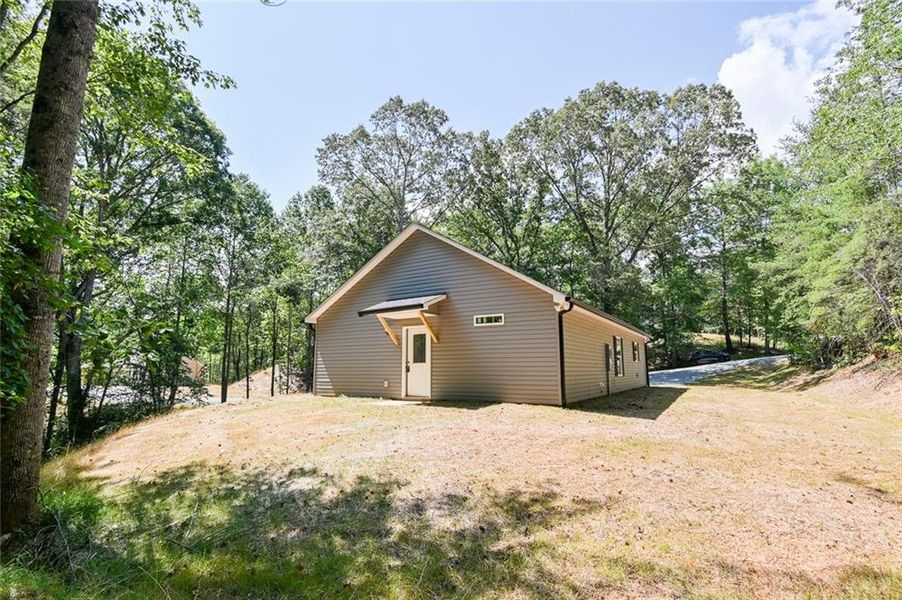 Front exterior of a new home in , Dahlonega, GA, highlighting curb appeal (Image 23).