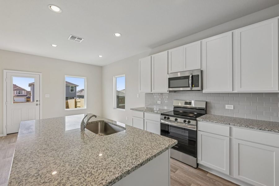 Furnished interior view inside a new home in Edgebrooke, Pflugerville (Image 9).