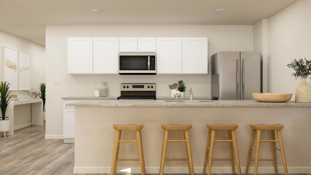 A kitchen with white cabinets. A kitchen with white cabinets.