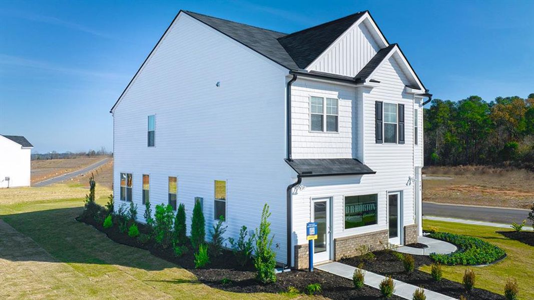 Front exterior of a new home in Poplar Preserve, Newnan, GA, highlighting curb appeal (Image 21).