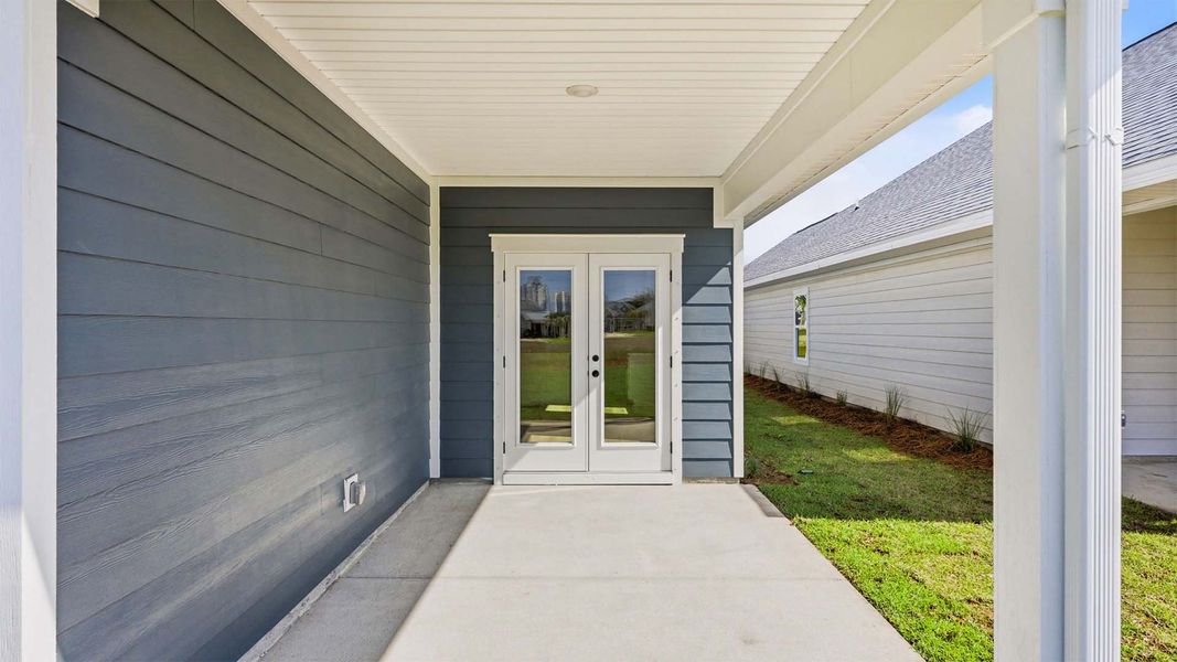 Exterior details and patio area of a home in Caballeros Estates At Hombre, Panama City Beach (Image 19).