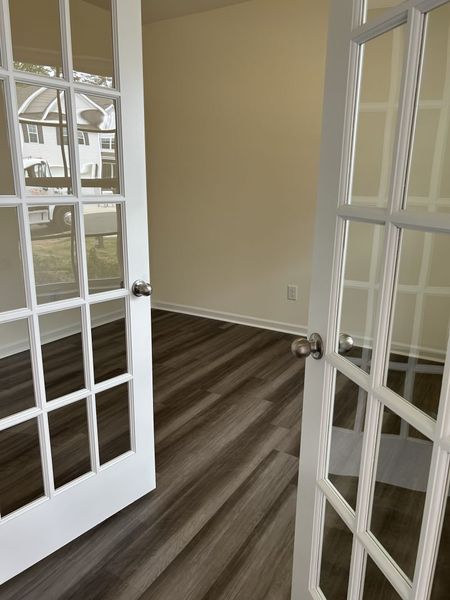 Spacious, unfurnished interior of a new home in The Wilcox, Greensboro (Image 19).