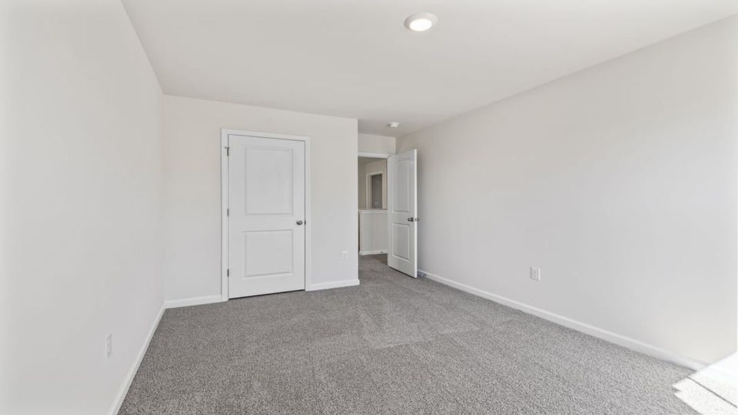 Spacious, unfurnished interior of a new home in Paddock Point, Roebuck (Image 18). Spacious, unfurnished interior of a new home in Paddock Point, Roebuck (Image 18).