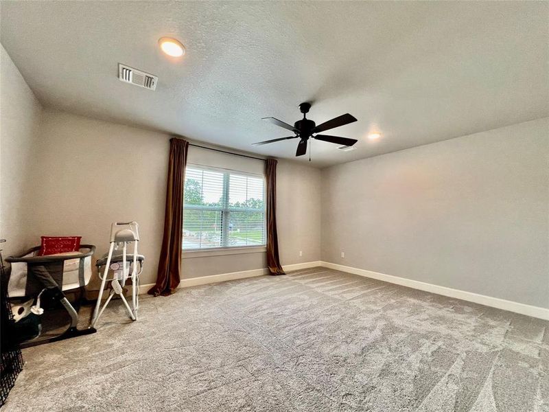 Walk in closet with attic access