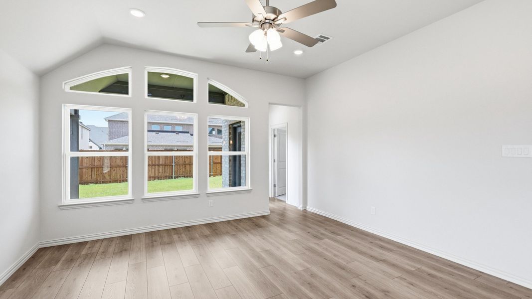 Furnished interior view inside a new home in Green Meadows Premier, Celina (Image 17).
