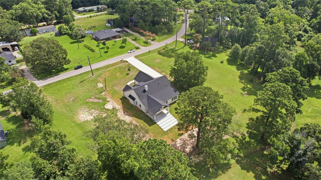 Front exterior of a new home in , Dayton, TX, highlighting curb appeal (Image 1). Front exterior of a new home in , Dayton, TX, highlighting curb appeal (Image 1).
