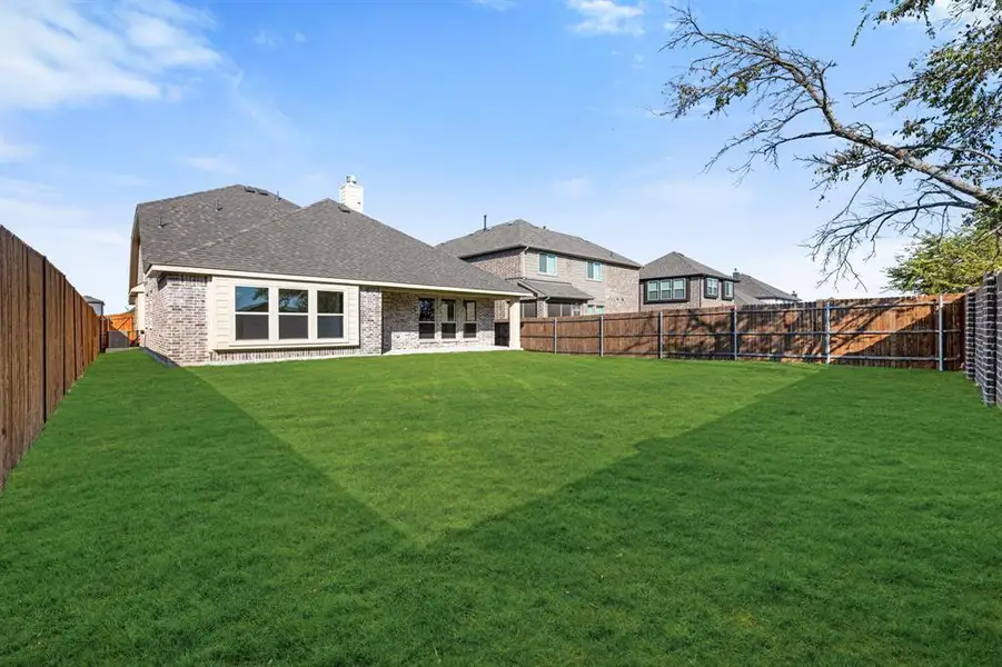 Exterior details and patio area of a home in Godley Ranch Classic, Godley (Image 4). Exterior details and patio area of a home in Godley Ranch Classic, Godley (Image 4).