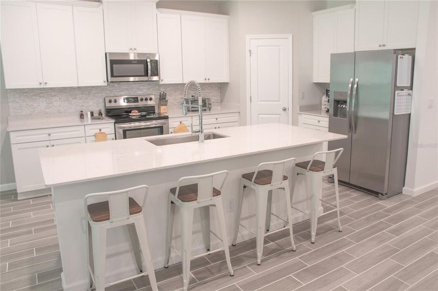 Furnished interior view inside a new home in , Gainesville (Image 19).