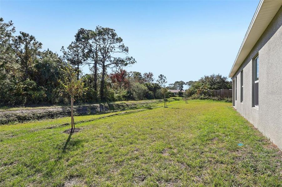 Exterior details and patio area of a home in Palm Bay Classic, Palm Bay (Image 3).
