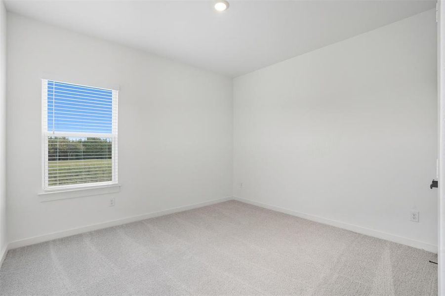 Unfurnished room featuring carpet and recessed lighting Unfurnished room featuring carpet and recessed lighting
